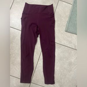 Size small Fabletics powerhold cropped legging in maroon/deep purple color